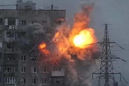Rocket hitting Ukrainian apt bldg