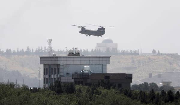 The scramble to evacuate U.S. personnel as Taliban have entered Kabul. chinook helicopter evacuating US Embassy